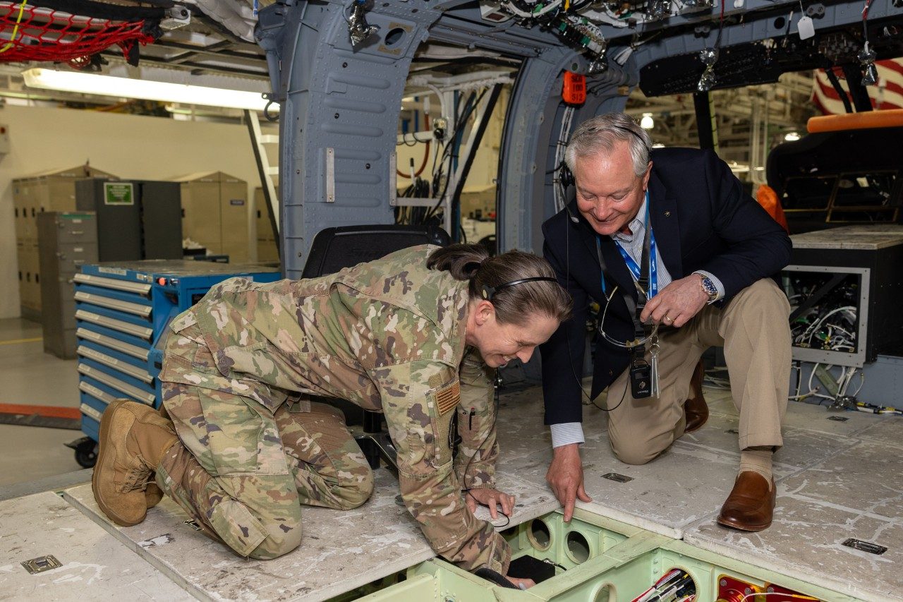 Sikorsky Director of Army and Air Force Programs Greg Hames watches U.S. Air Force Major General Denise Donnell, Assistant Adjutant General and Commander of the New York Air National Guard, sign HH-60W aircraft #53. This will be the first HH-60W delivered to the New York Air National Guard. Photo courtesy Sikorsky, a Lockheed Martin company.