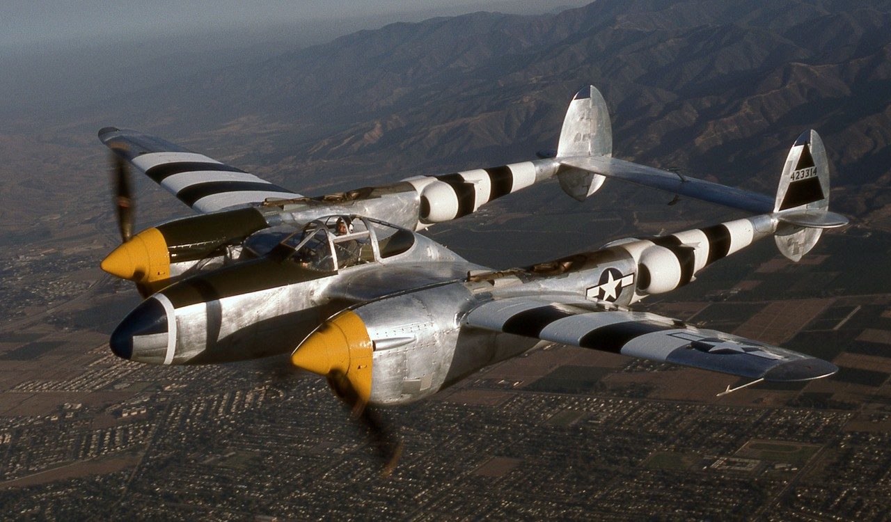 A Lockheed P-38 Lightning in D-Day invasion colours.